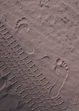 Footprints in grey Sand