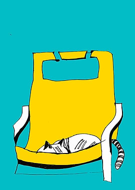 Cat sleeping in armchair