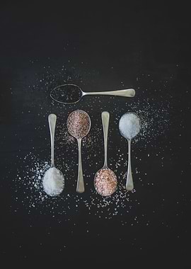 Spices on silver spoons