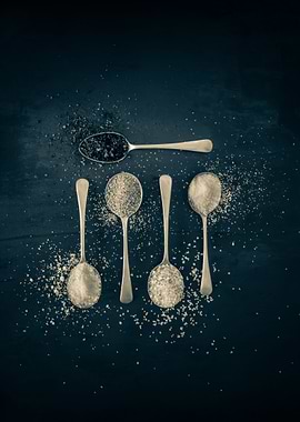Spices on silver spoons