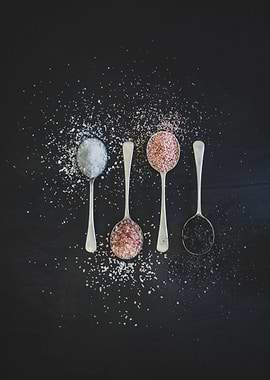 Spices on silver spoons
