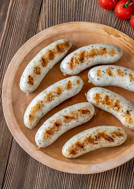 Grilled sausages on plate
