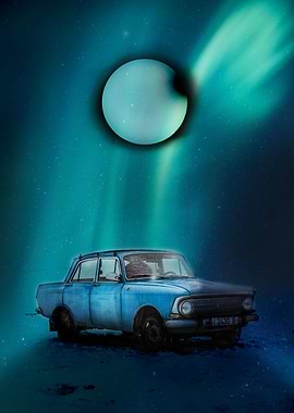 Car under northern lights