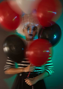 Colored balloons and clown