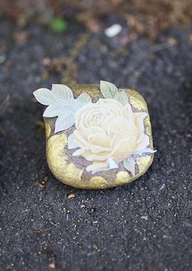 Kids drawing on stones