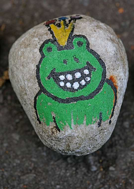 Kids drawing on stones