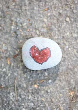 Kids drawing on stones