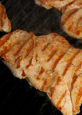 Meat baking on Greek grill