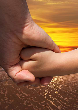 hand of father and son