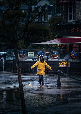 A little girl in the rain
