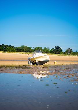 boat laying on the beach