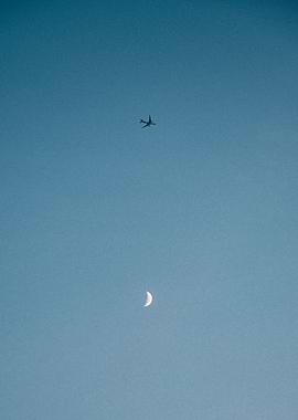 Airplane and moon