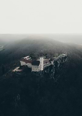 Castle on moody mountain