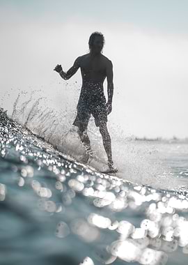 Surfboarder standing up