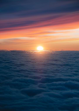 Sunset Above the Clouds