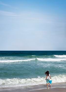 Girl seaside waves bucket