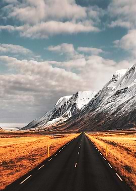 Empty highway by Mountains