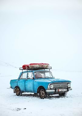 blue car in winter