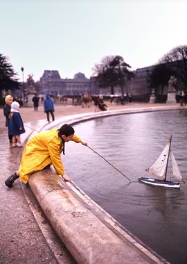 Young boy with his boat