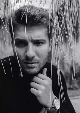 Man Amidst Hanging Fauna