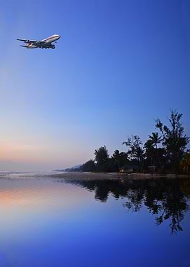 Airplane Over The Beach