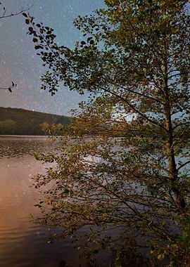 Mountain lake shore suset