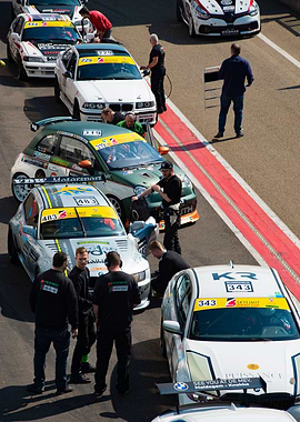 Race cars in the pit lane