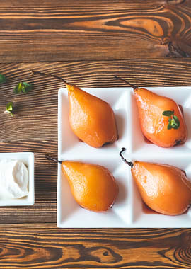 Poached pears on the plate