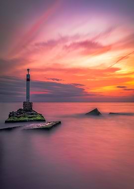 Lighthouse with fiery sky