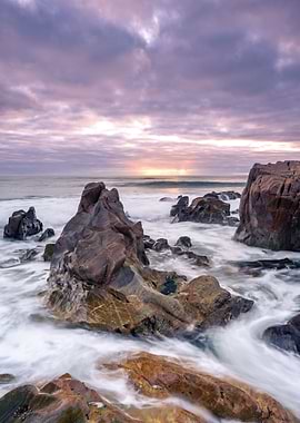 Sunset rocky beach Gaia