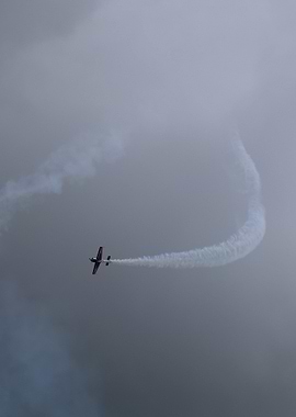 Aerobatic Plane Smoke Trail
