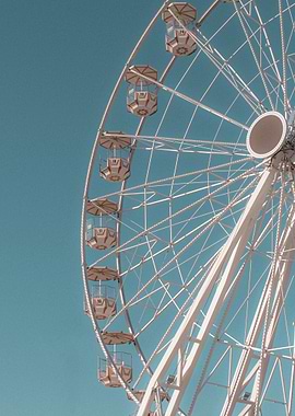 Ferris Wheel Against Blue Sky