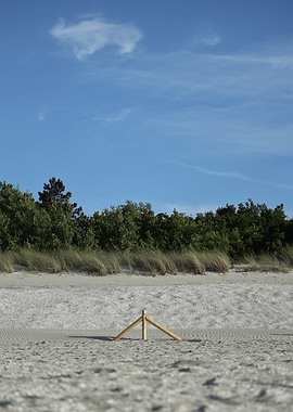 Wooden Fence on Sandy Beach