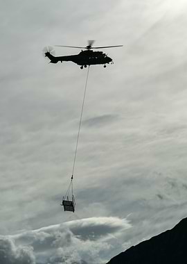 Helicopter Lifting Cargo Axalp