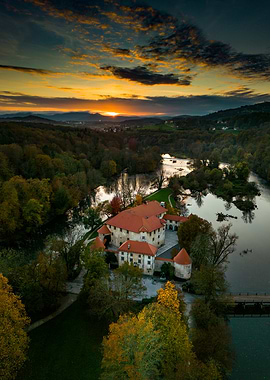 Castle by the River at Sunset