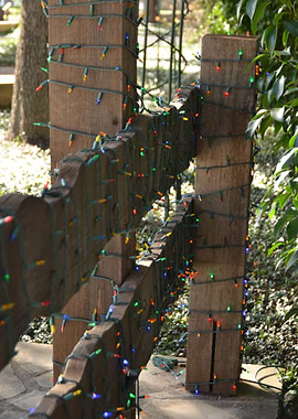 Festive Light on Fence Post