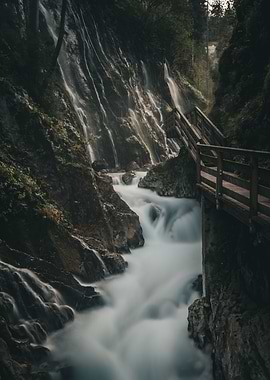 Waterfall and Wooden Bridge