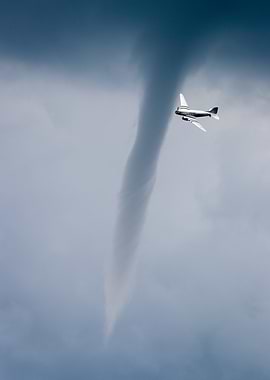 Douglas DC-3 Flying Near Tornado