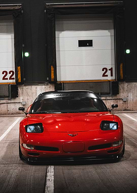 Red Corvette in Garage