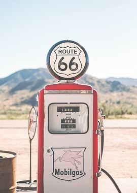 Route 66, USA I Deep America vintage retro gas pump in front of Arizona California road landscape to pastel aesthetic of summer under the sun of a stopover at the gas station during a road trip