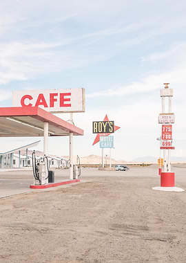 Route 66, USA I Mythical historic Roy's Cafe and Motel gas station in a California desert landscape in an American retro vintage american countryside with summer light pastel red and blue aesthetic