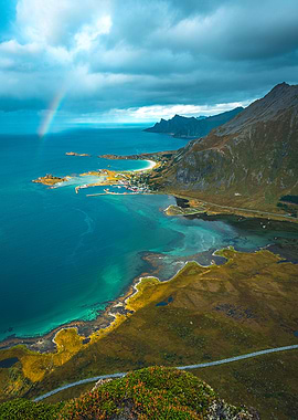 Coastal Fjord with Rainbow surrounded by Mountains