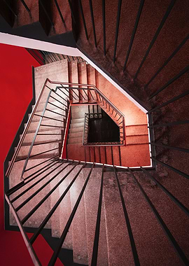 Brown and red spiral stairs