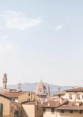 Florence, Italy I Skyline view of italian rooftops and Duomo Santa Maria del Fiore cathedral church with summer pastel aesthetic in sunny orange tones for living la dolce vita under the sun blue sky