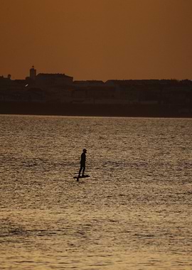 Silhouetted E-Foiler at Sunset Baleal Portugal