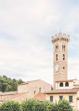 Florence, Italy I Medieval architecture tower in a pastel summer italian country village in Tuscany in Fiesole among the mountains, olive groves and cypress trees to experience la dolce vita