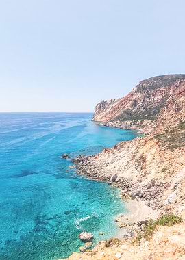 Milos, Greece I Wild boho nature mountain view and turquoise blue water on a dreamy beach paradise on Cyclades islands such as Santorini or Mykonos red beach overlooking the Mediterranean Sea view