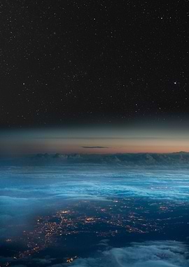 Night Sky Above City Lights and Cloud