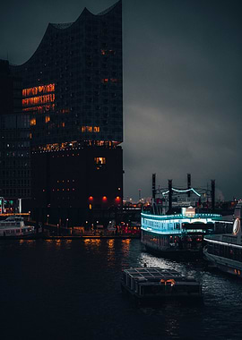 Nighttime Cityscape with Boats