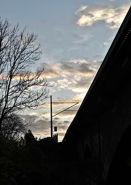 Silhouetted Bridge and Sky